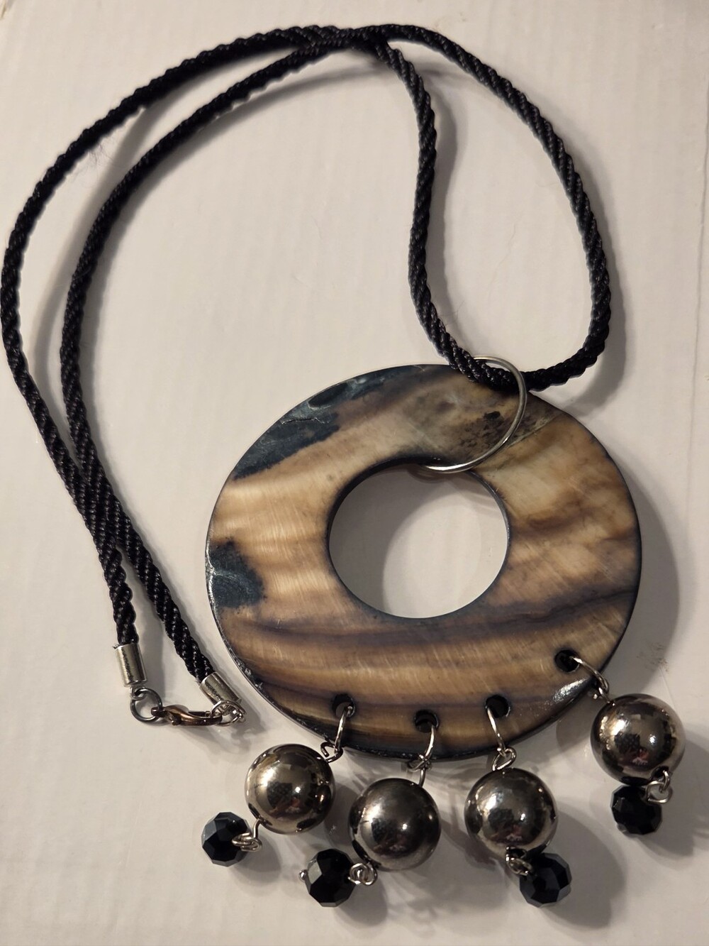 mother Of Pearl Donut Pendant Necklace with Black and Brown Swirl